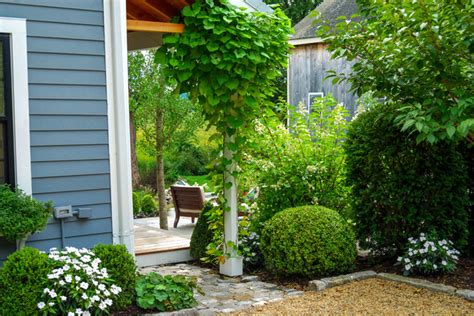 18 breathtaking farmhouse landscape designs you'll wish to have in your garden 0 comments how much time you spend enjoying the beautiful weather from the comfort of your own property is directly dependent on how much effort you've put into making the outdoor areas a place worth visiting. Country Farm House - Farmhouse - Landscape - boston - by a ...