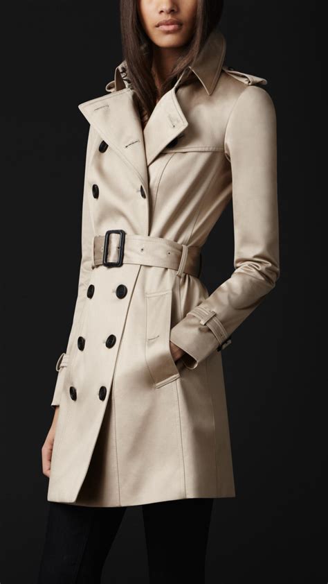 An outer piece of clothing with sleeves that is worn over other clothes, usually for warmth: Burberry Prorsum Cotton Sateen Trench Coat in Natural - Lyst