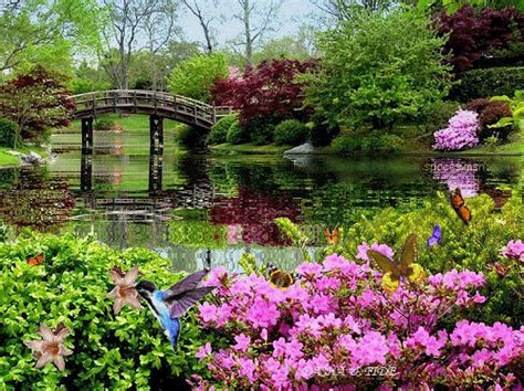 A Bridge Over A Pond Surrounded By Colorful Flowers And Greenery In The