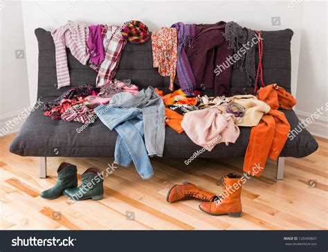 What Messy Colorful Clothing On Sofa Stock Photo 129499847 Shutterstock