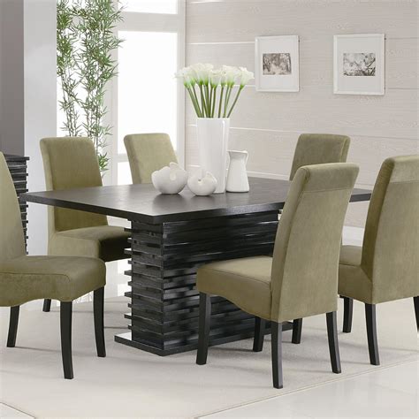 Make sure that your dining table matches for your room and your needs as well. Dining Room Table Seats 12 for Big Family - HomesFeed