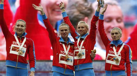 Russian Athletes Kiss On Podium In Protest Sportsnetca