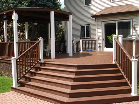 A Deck With Steps Leading Up To A Gazebo