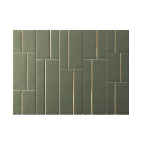 a green tile wall with gold lines on it