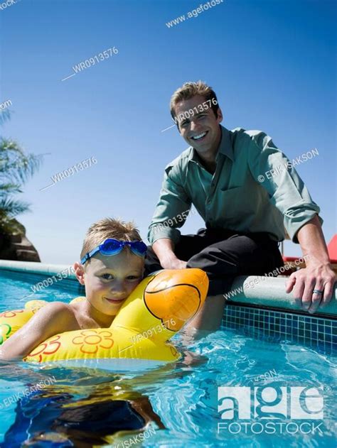 Father And Son At Swimming Pool Stock Photo Picture And Royalty Free
