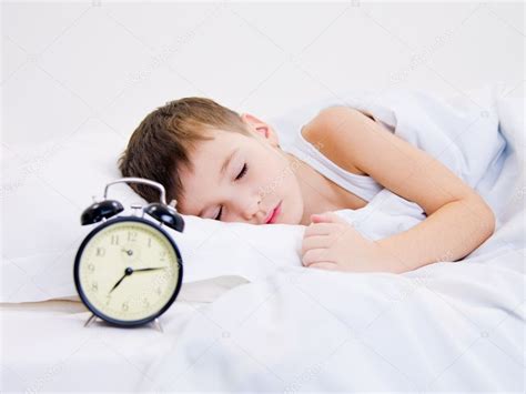 Little Kid Sleeping With Clock — Stock Photo © Valuavitaly 1538120