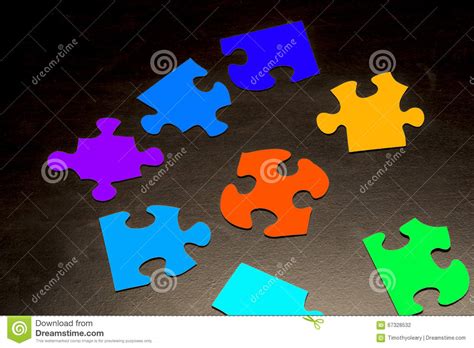 Jigsaw pieces connected in a round shape. Puzzle Pieces With Different Shapes And Colors Stock Photo ...