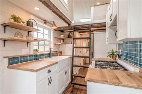 While this tiny kitchen is about the same size, the creative design and layout turn it into a gorgeous kitchen that is just as cooking worthy as any big having all the major amenities on one side of this galley kitchen leaves the other side open for plenty of counter space for food prep and cabinets for. Family of Four's 375 Sq. Ft. Tiny Home on Wheels by Summit ...