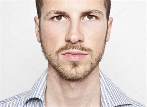 Young Mans Face Serious Expression Stock Photo By ©tommasolizzul 13764564