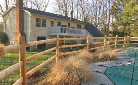 Modern split rail fences have evolved and most split rail fences these days use fence posts with holes cut through them to allow installation of three or four horizontal split rails between the posts. Image result for split rail pool fence | Backyard fences