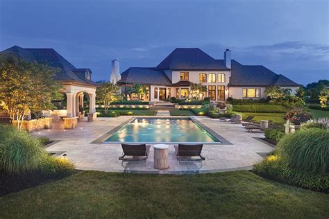 A French Country Inspired Pool Scape Boasts A Travertine Patio Custom