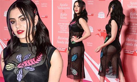 Charli XCX Steps Out In INSECT Themed Sheer Dress For Naked Heart