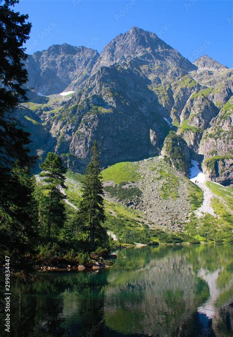 Morskie Oko The Famous Lake In The Polish Tatra Mountains And Mount
