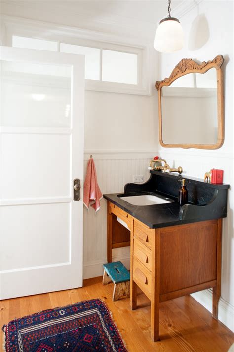 You'll definitely want counter height, plus it needs to be a little wider so there is plenty of room for the sink. 10 Pieces Of Furniture To Turn Into A Bathroom Vanity