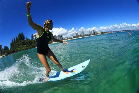 lisa andersen soaking up the epic summer conditions at the roxypro surfing surf life ride