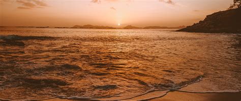Download Wallpaper 2560x1080 Sea Beach Sunset Dusk