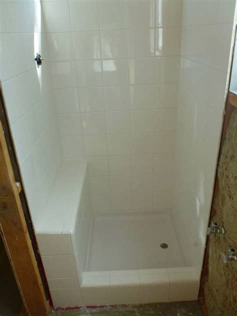 This is the second article in our building a shower series and in it we will walk through the process of building a custom shower pan using the traditional technique of a sloped mortar base with a. tiny shower 24 x30 with tiled bench( 24x24 shower pan ...
