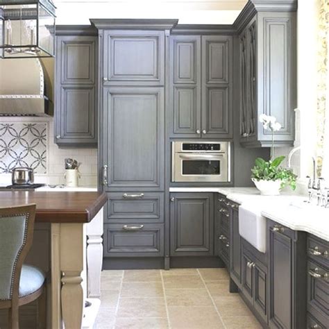 When the primer has dried, use a 150 to 200 grit sandpaper to smooth the surface, then remove surface dust with a clean, damp cloth. Using Chalk Paint to Refinish Kitchen Cabinets - Wilker Do ...