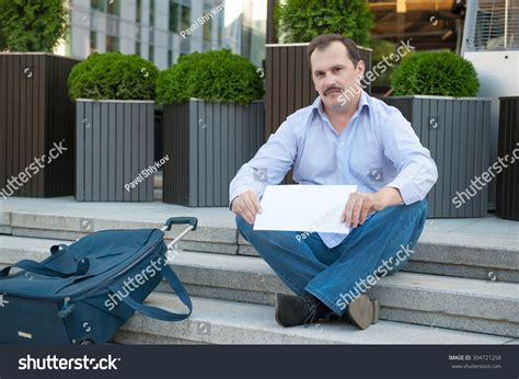Sad Man Sitting On Steps Suitcase库存照片304721258 Shutterstock