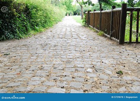 Medieval Cobblestone Footpath In Saint Denis Park Stock Photo Image