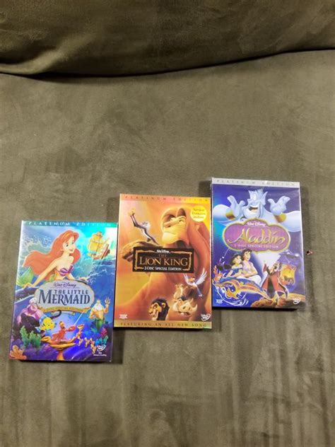 Walt Disneys Aladdin Little Mermaid Lion King Tangled Dvds For