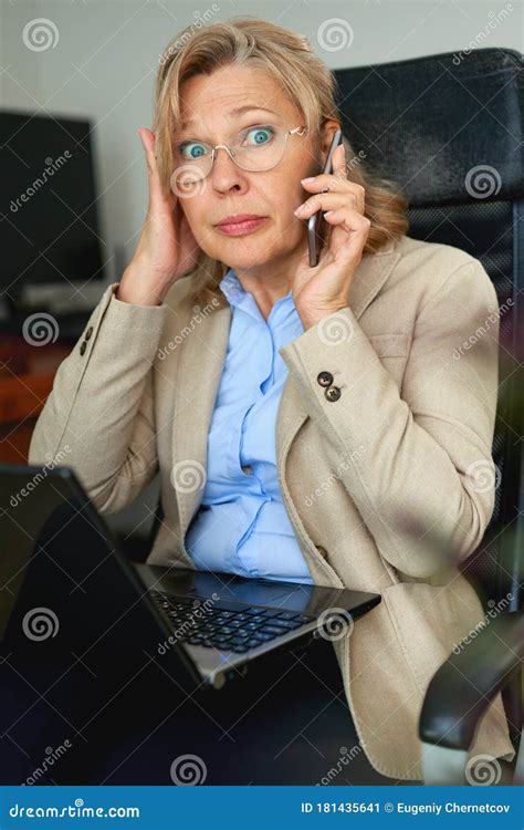 Portrait Of Mature Female Boss Talking On Phone In Office Stock Image Image Of Boss Empowered