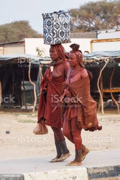 Opuwo Namibia Himba Women With The Typical Necklace And Hairstyle In