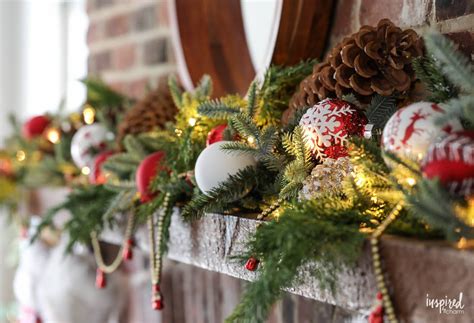 Deck the halls for less next christmas with our festive christmas décor! Red and Rustic Christmas Mantel - holiday decorating ideas