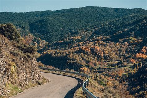 Road With Dangerous Curve At Autumn By Stocksy Contributor Blue