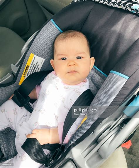 Baby Girl In Car Seat High Res Stock Photo Getty Images