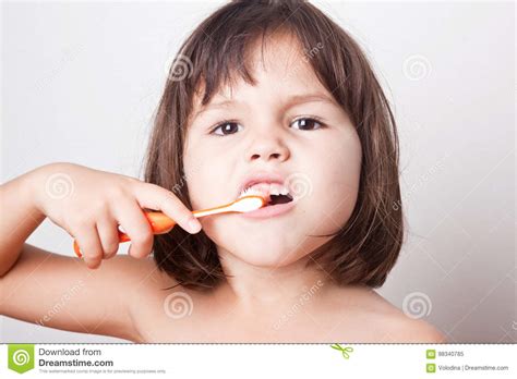 Portrait Of Girl Cleans Teeth Stock Image Image Of Dental Girl 98340785