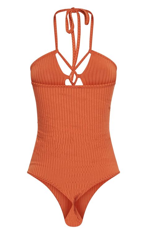 Burnt Orange Ribbed Halterneck Lace Up Bodysuit Prettylittlething Usa