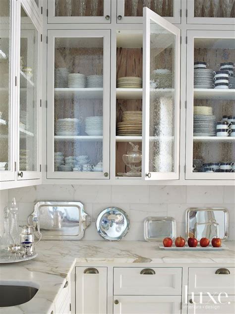 The most favorite painting to complete the glass for kitchen cabinet doors is white. A Gallery of Glass Kitchen Cabinet Doors That Are Gorgeous ...