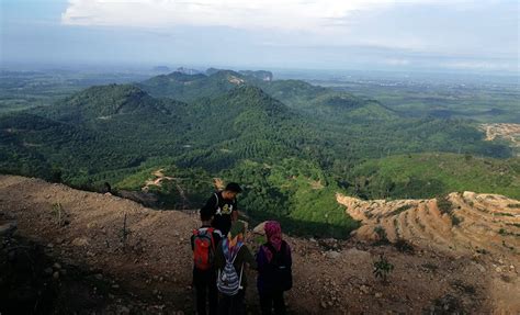 The landscape is in fact the result of excavation for the brick making. A Hikers Guide to Bukit Tok Dun, Perlis by PTT Outdoor