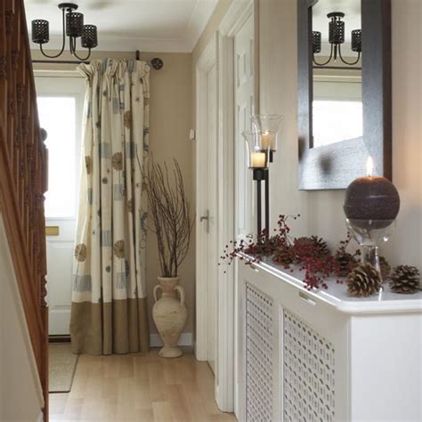 A few simple accessories and furniture pieces can create a gorgeous transitional space. Neutral hallway | housetohome.co.uk