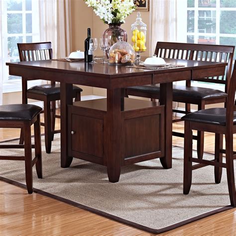 New Classic Kaylee Counter Height Table With Storage Pedestal Base Beck S Furniture Pub Tables
