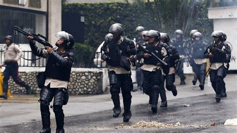 Venezuelan Policeman Killed In Caracas Violence Bbc News