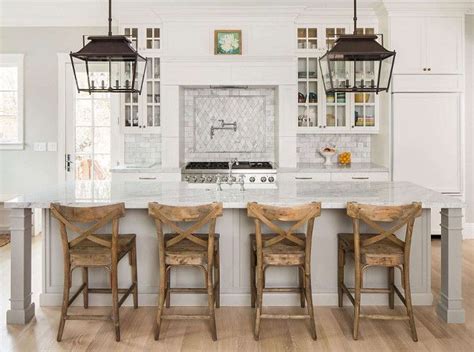 White Kitchen With Rustic Island Chairs Stools And Lantern Style Pendants Kitchen Island With