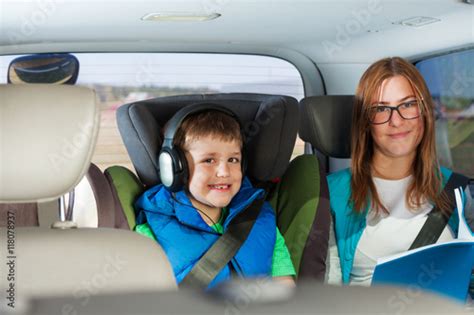Portrait Of Happy Passengers Sitting In The Car Stock Photo And
