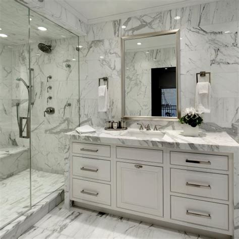 Give your home elegant appeal with marble. White Marble Bathroom With Glass Walk-In Shower | HGTV