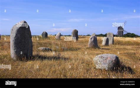 Stone Circle And Windmill Island Oland Sweden Stock Photo Alamy