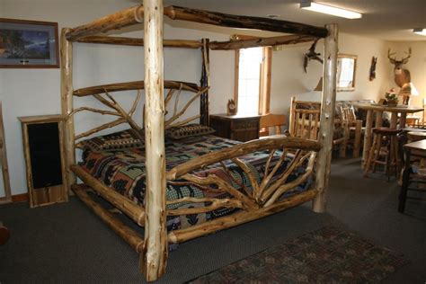 An inviting canopy bed, fit for a king. Bent Branch Canopy Log Bed