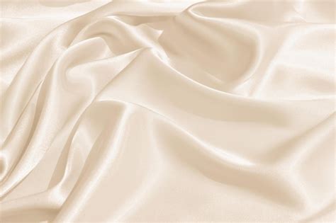 Premium Photo The Texture Of The Satin Fabric Of Beige Color For The