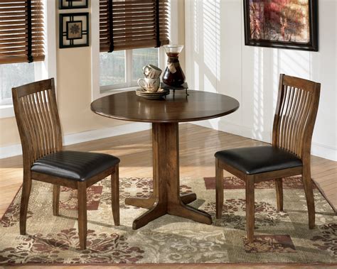 Rectangular dining tables blend seamlessly into traditional and contemporary spaces alike. Stuman Round Drop Leaf Dining Table Set, D293-15 ...