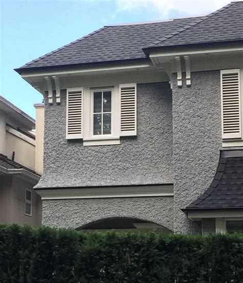 As a trim color, it can accent white or neutral gray exteriors. Beautiful Exterior remodel with a grey stucco finish ...