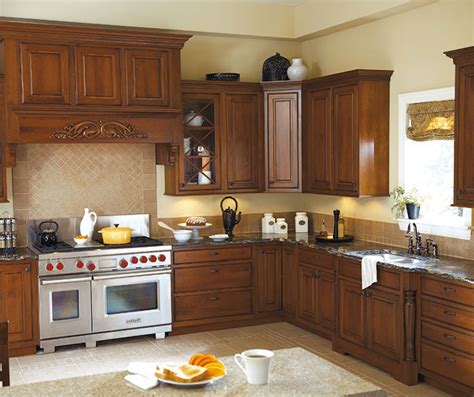 Since it closely resembles white, cream kitchen cabinets can be paired with practically any other color countertop, flooring or backsplash with great results. Inset Kitchen Cabinets - Omega Cabinetry