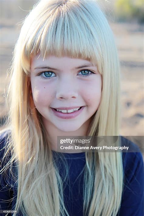 Portrait Blond Haired Blue Eyed Girl High Res Stock Photo Getty Images