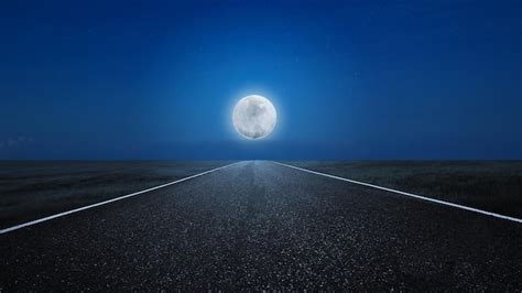 Premium Photo Asphalt Road With A Meadow Field View With A Full Moon