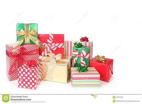 Here's that secret recipe, filled with cinnamon and covered with yummy icing. Pretty Christmas Gifts Wrapped Up On White Stock Photo ...