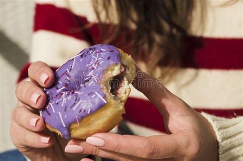 Woman Holds Hand A Bitten Donut Stock Image Image Of Glaze Holiday